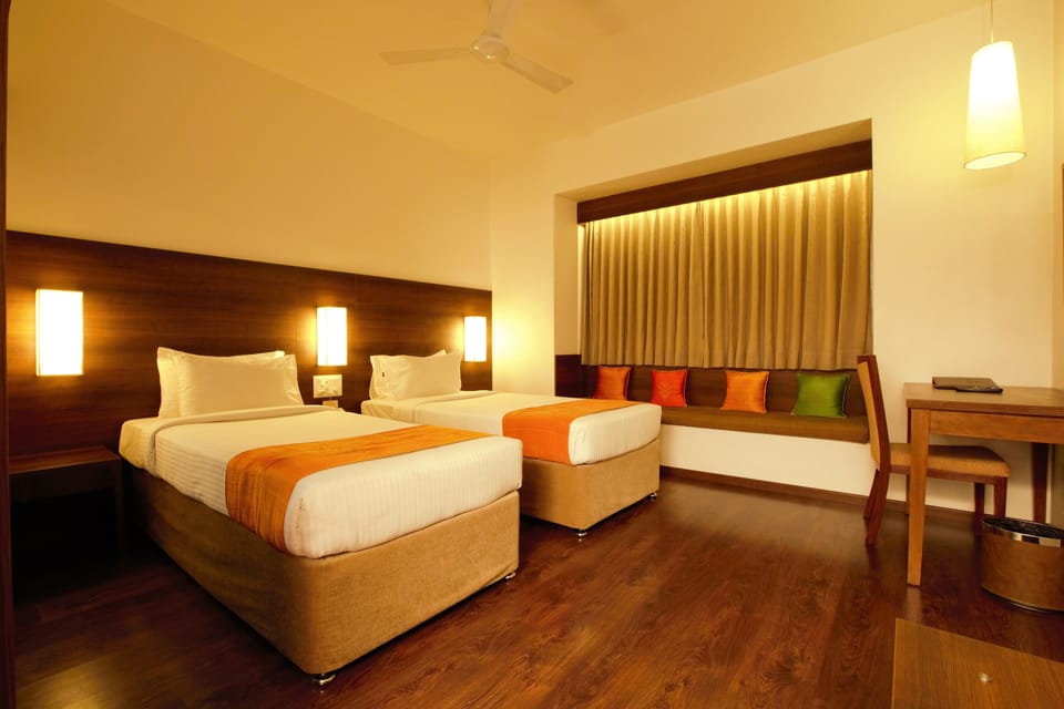 Executive Room | Premium bedding, minibar, in-room safe, desk