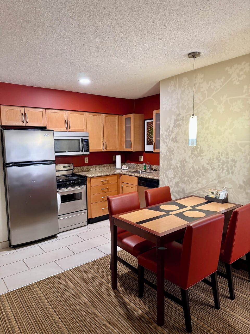 Full-size fridge, microwave, stovetop, dishwasher