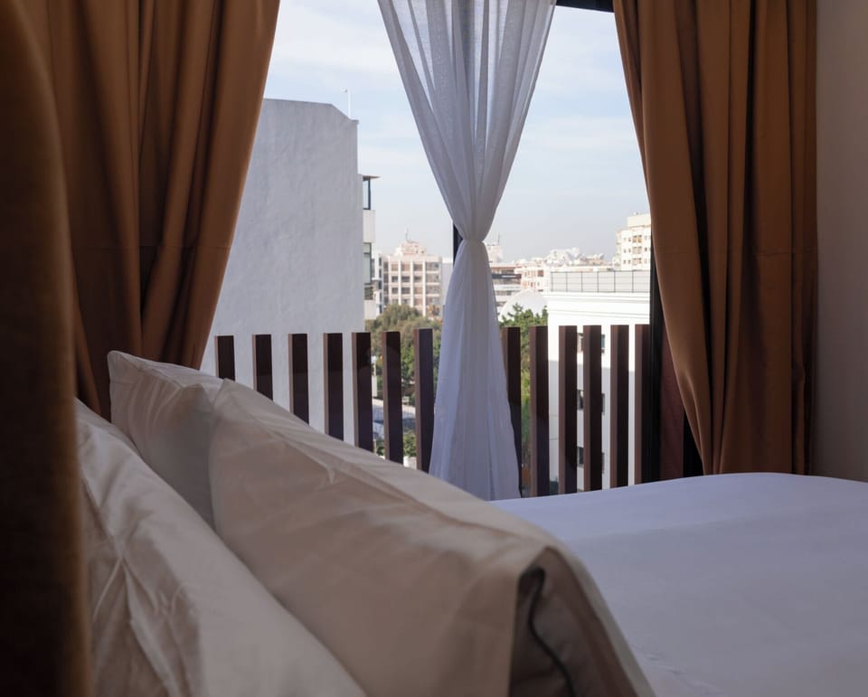 Exclusive Apartment, City View | Blackout drapes, soundproofing, iron/ironing board, free WiFi