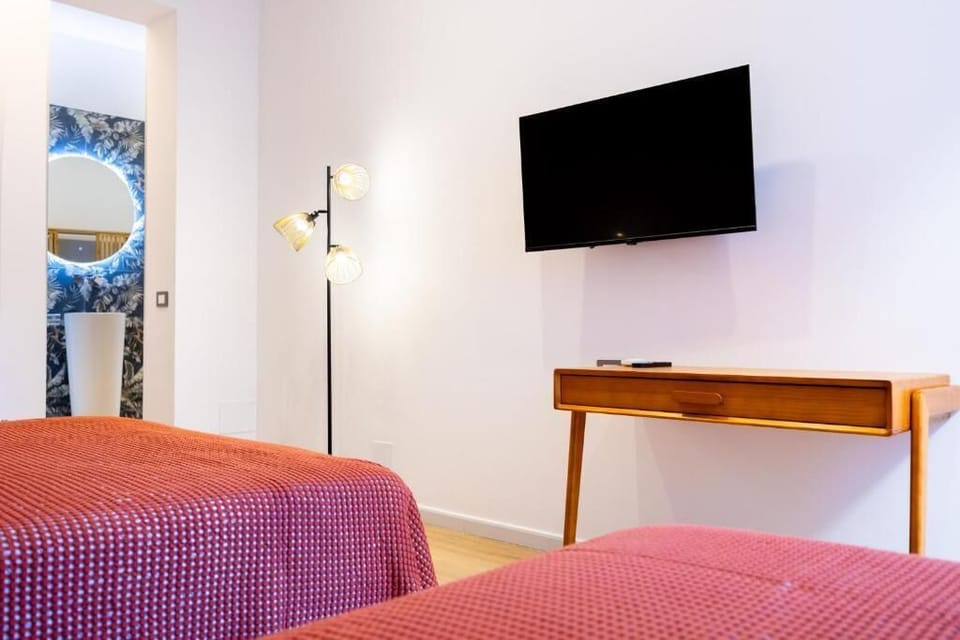 Deluxe Triple Room, Balcony | In-room safe, iron/ironing board (on request), WiFi (free)