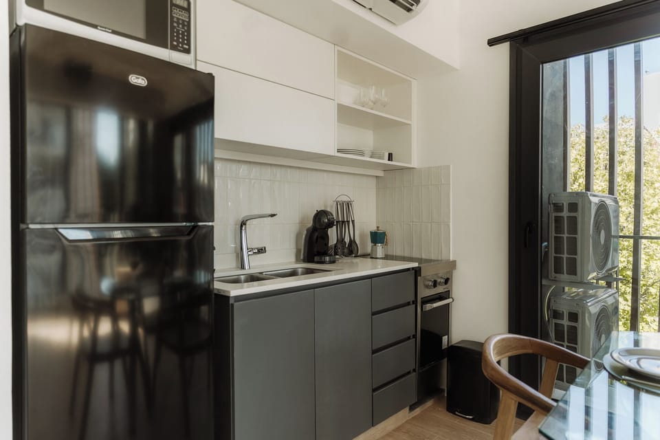 Apartment (5A) | Private kitchen | Full-size fridge, microwave, oven, cookware/dishes/utensils