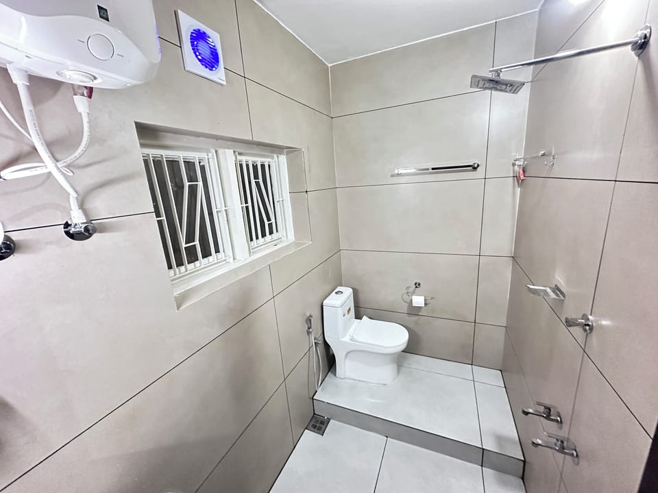 DWARAKA-104 Standard | Bathroom | Shower, soap, shampoo, toilet paper