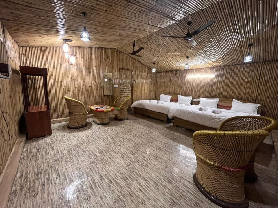 Family Suite, Balcony, Garden View | In-room safe, iron/ironing board