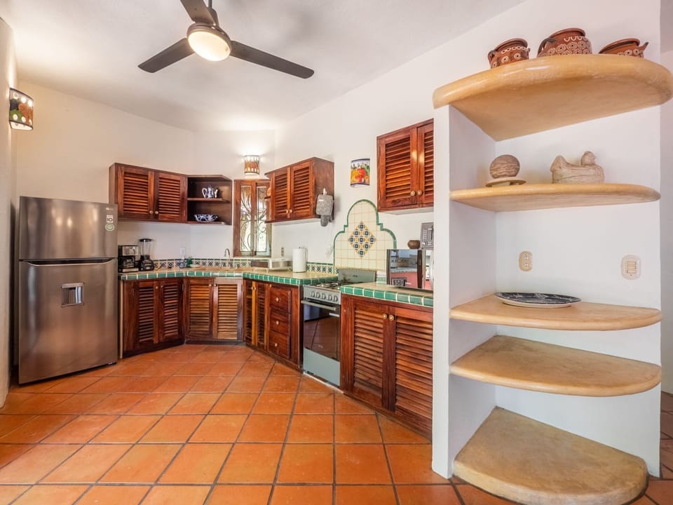Villa Cielo | Private kitchen | Full-size fridge, microwave, oven, stovetop