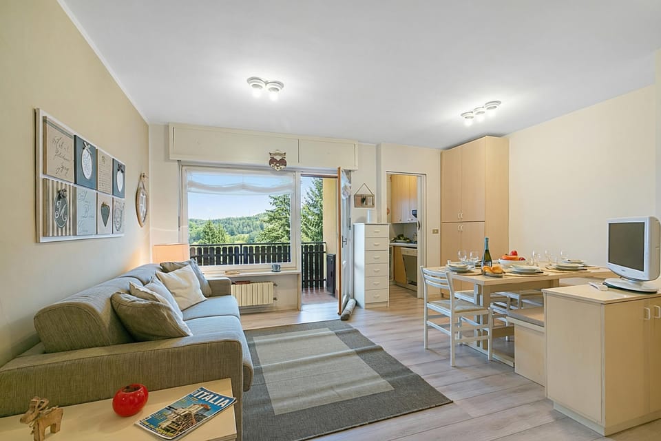 Standard Apartment, 2 Bedrooms, Balcony (Home Cotolivier 59) | Living area | Flat-screen TV