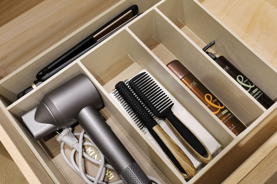 Hair dryer, towels, soap, shampoo