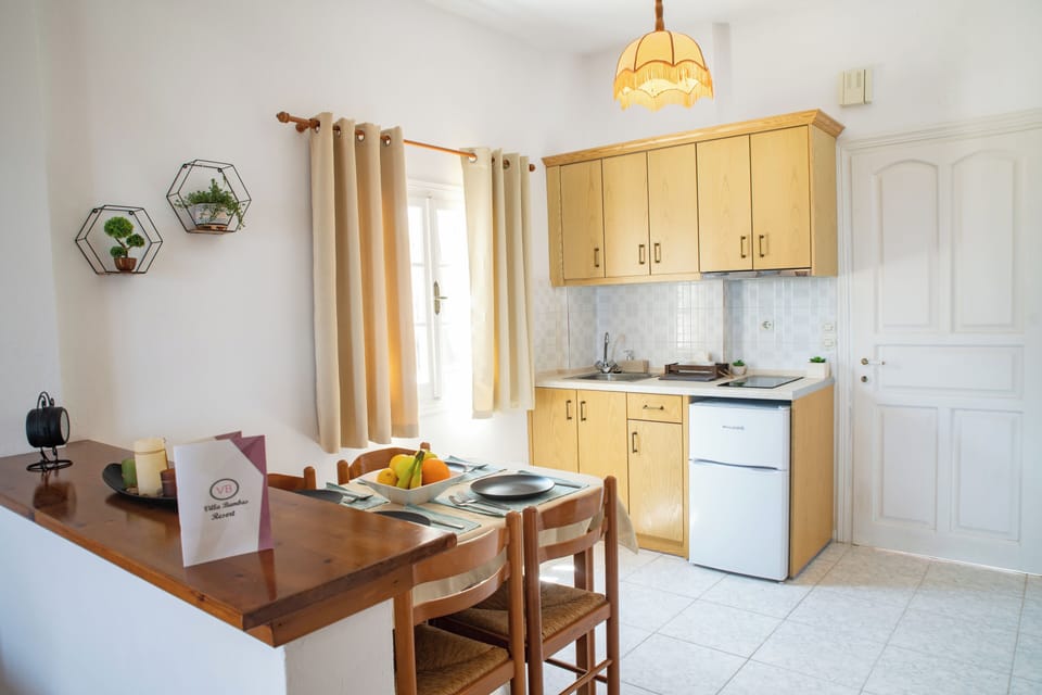 Standard Twin Room, 2 Twin Beds, Garden View, Garden Area | Private kitchen | Coffee/tea maker, electric kettle, highchair, dining tables