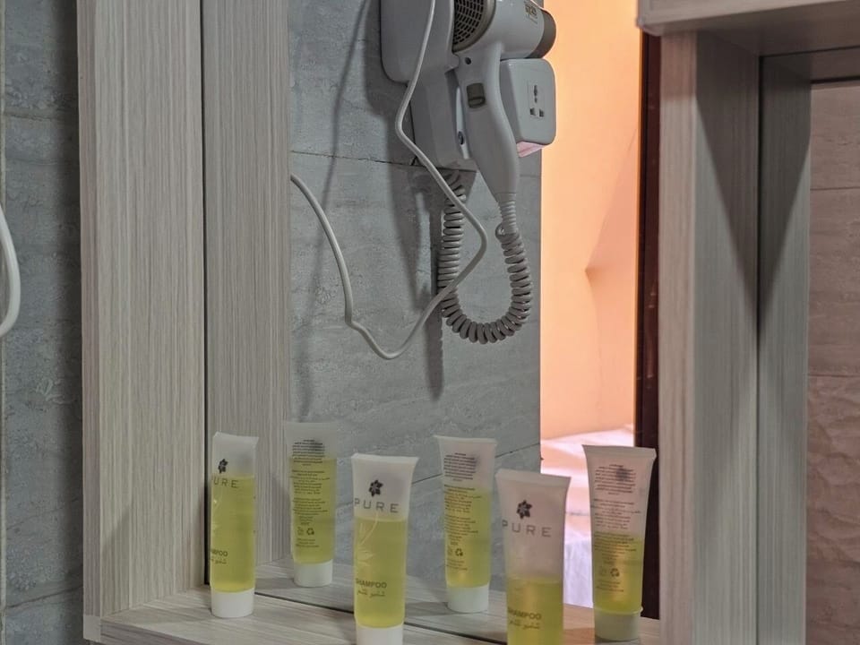 Deluxe Double Room, Balcony, Mountain View | Bathroom | Shower, free toiletries, hair dryer, towels
