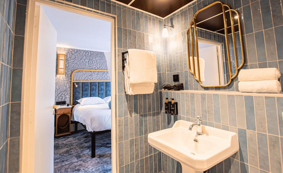 Classic Double or Twin Room | Bathroom | Hair dryer, slippers, towels, soap