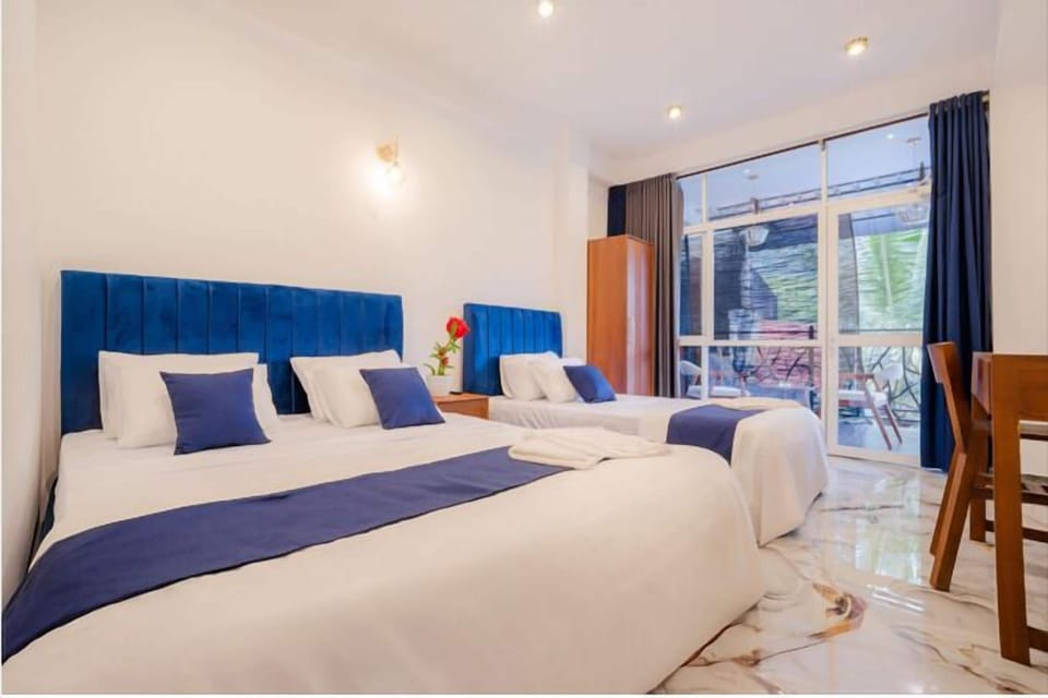 Deluxe Triple Room, Balcony | Free WiFi