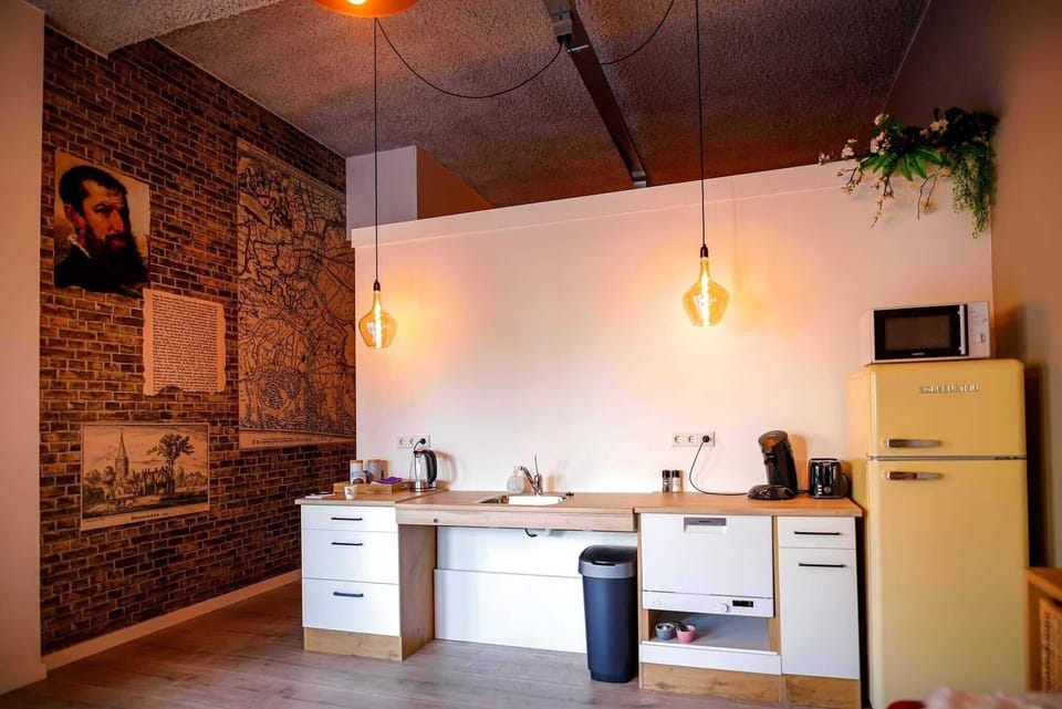 Luxury Studio, 1 King Bed, Mobility Accessible, Ground Floor | Private kitchen | Full-size fridge, microwave, oven, stovetop