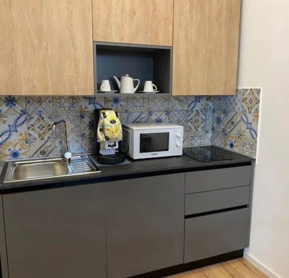 Luxury Suite, 1 Double Bed with Sofa bed, Private Bathroom, City View | Private kitchen | Espresso maker, coffee/tea maker, electric kettle, highchair
