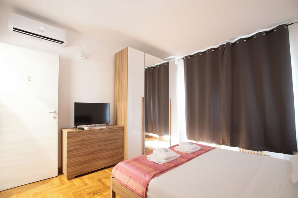 Comfort Room, Balcony, City View | Desk, laptop workspace, blackout drapes, iron/ironing board (on request)