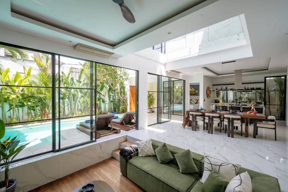 Deluxe Villa, 3 Bedrooms, Pool View | Living room | 55-inch TV with cable channels