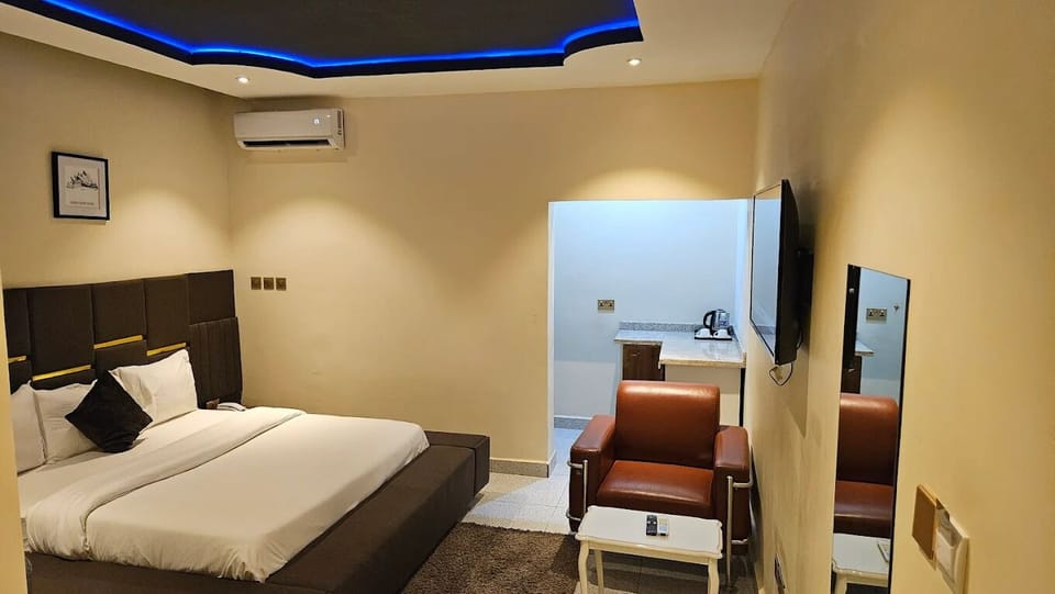 Deluxe Room, Balcony, City View | Desk, laptop workspace, blackout drapes, soundproofing