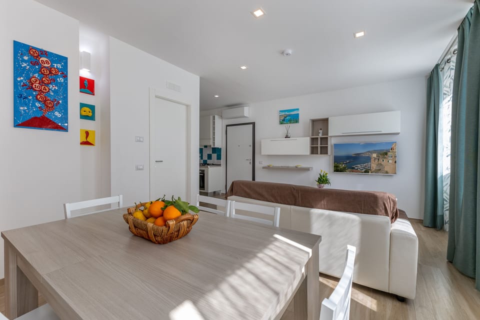 Apartment, 2 Bedrooms, Patio | Living room | 40-inch LED TV with digital channels