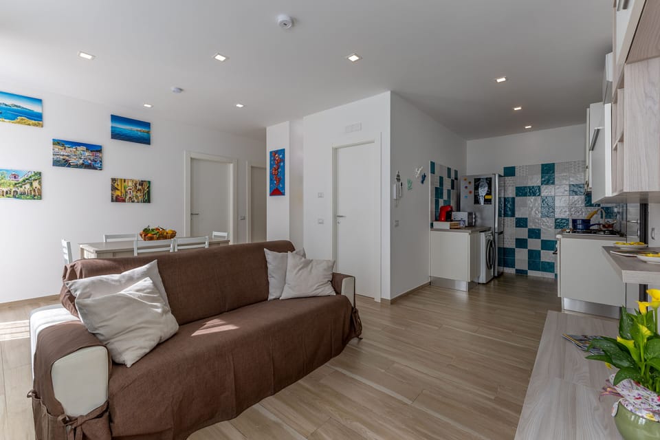 Apartment, 2 Bedrooms, Patio | Living area | 40-inch LED TV with digital channels