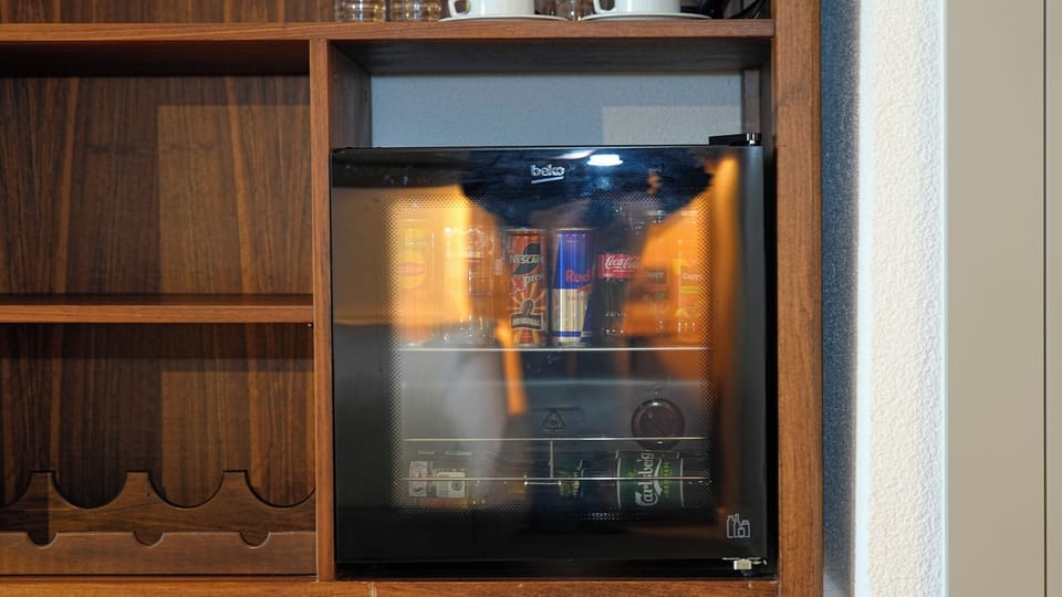 Deluxe Twin Room, Balcony, Mountain View | Minibar