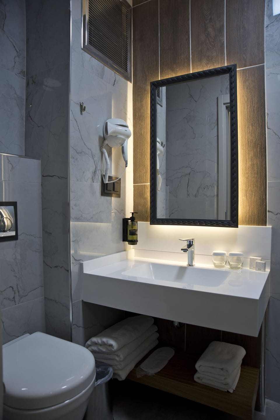 Shower, eco-friendly toiletries, hair dryer, bidet