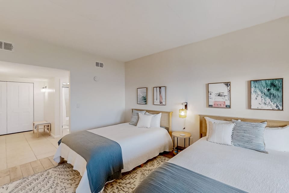 Condo, Multiple Beds, Balcony, Beach View (306 Sandcastles) | 1 bedroom, individually decorated, individually furnished, bed sheets
