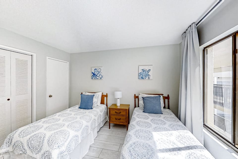 Condo, Multiple Beds, Patio, Beach View (B175 Amelia Surf and Racquet) | 2 bedrooms, individually decorated, individually furnished, bed sheets