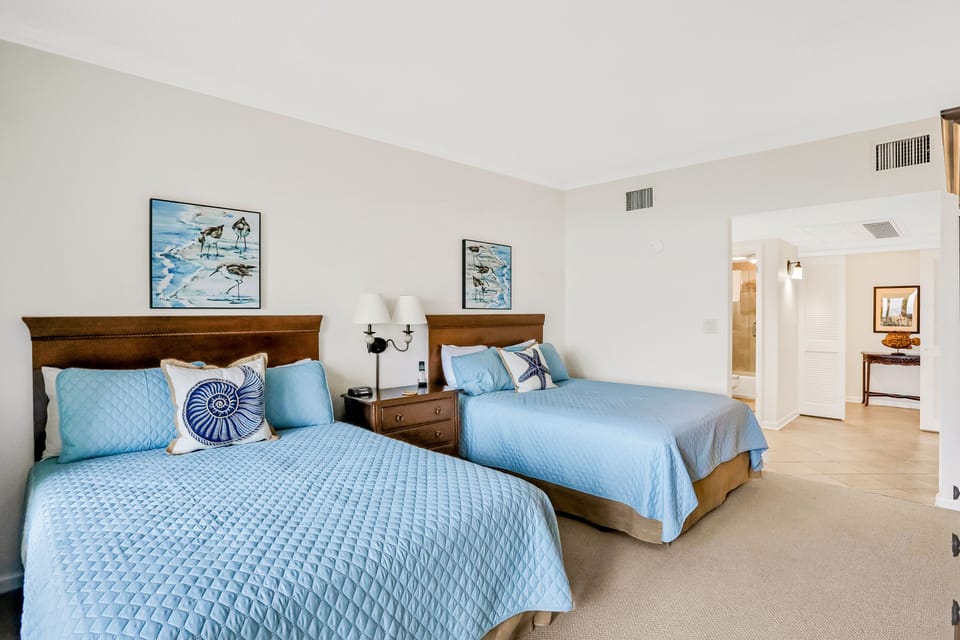 Condo, Multiple Beds, Patio, Beach View (234 235 Sandcastles) | 2 bedrooms, individually decorated, individually furnished, bed sheets