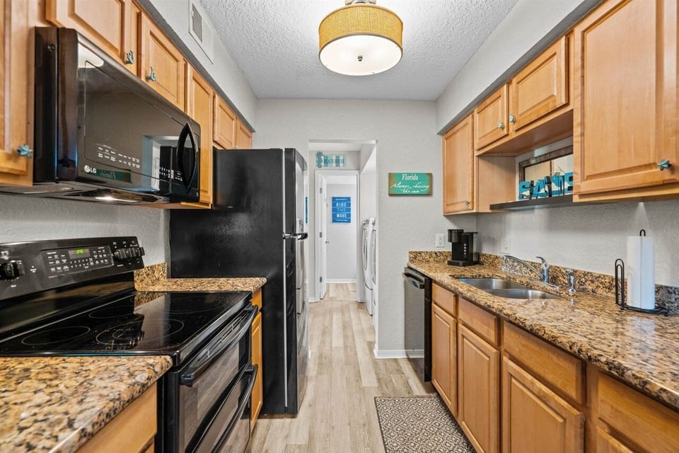 Condo, Multiple Beds, Patio, Pool View (Clipper Cabana Beachwalk Condo) | Private kitchen