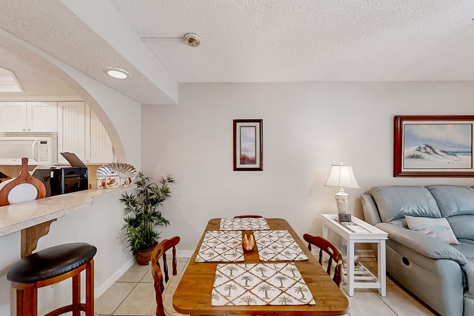 Condo, Multiple Beds, Kitchen, Pool View (Pelican Inlet E133) | 2 bedrooms, individually decorated, individually furnished, bed sheets
