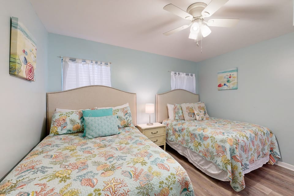 Condo, Multiple Beds, Balcony, Pool View (Amelia South Condo N2) | 2 bedrooms, individually decorated, individually furnished