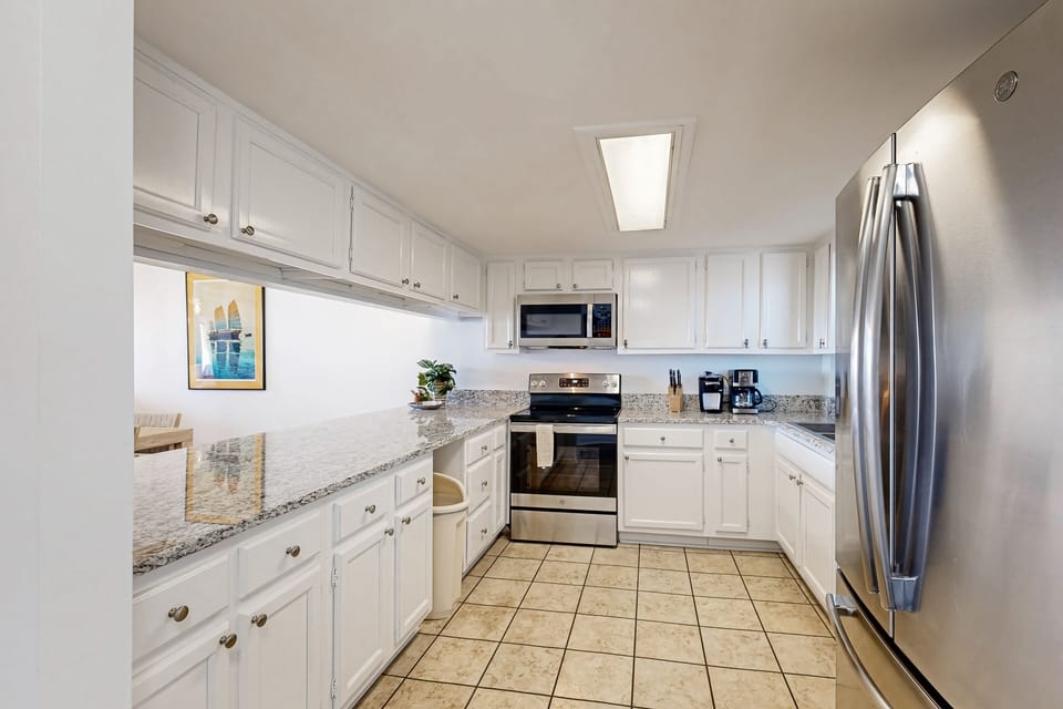 Condo, Multiple Beds, Patio, Ocean View (302 Atlantis on Amelia) | Private kitchen