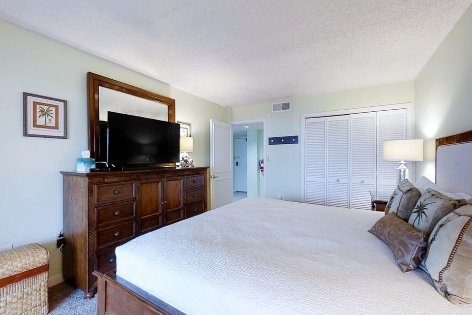Condo, 1 King Bed with Sofa bed, Patio, Ocean View (A116 Amelia Surf and Racquet) | 1 bedroom, individually decorated, individually furnished