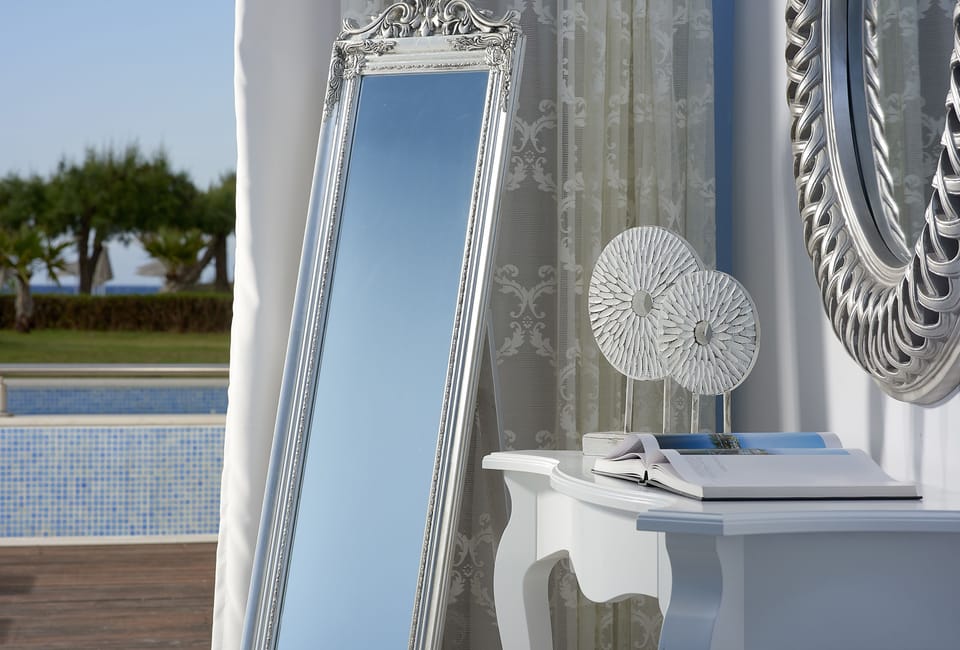 Junior Suite, Private Pool, Sea View | Minibar, in-room safe, iron/ironing board, free cribs/infant beds