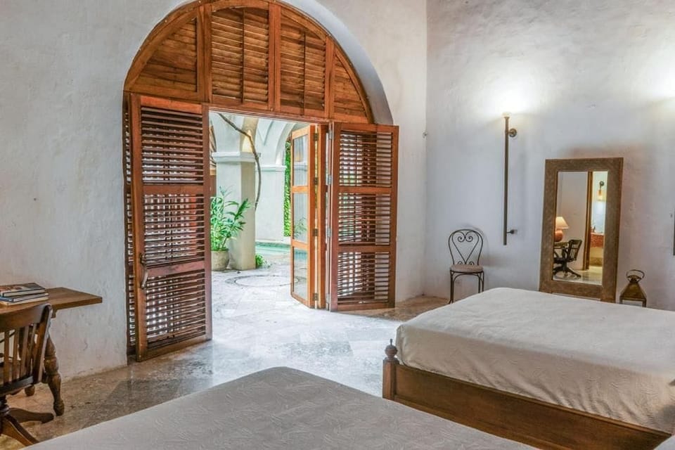 Premium Quadruple Room, Courtyard View | Blackout drapes, WiFi (free), bed sheets