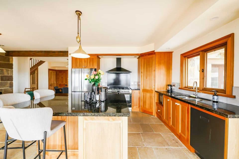 Deluxe Townhome, Beach View | Private kitchen | Highchair