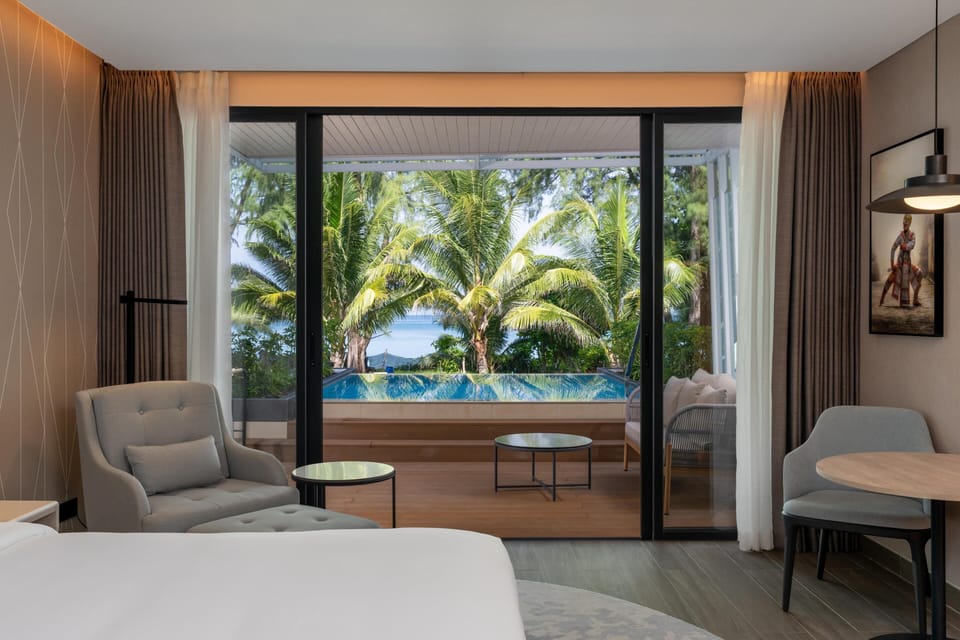 Premium Room, Oceanfront (With Pool) | Minibar, in-room safe, desk, soundproofing