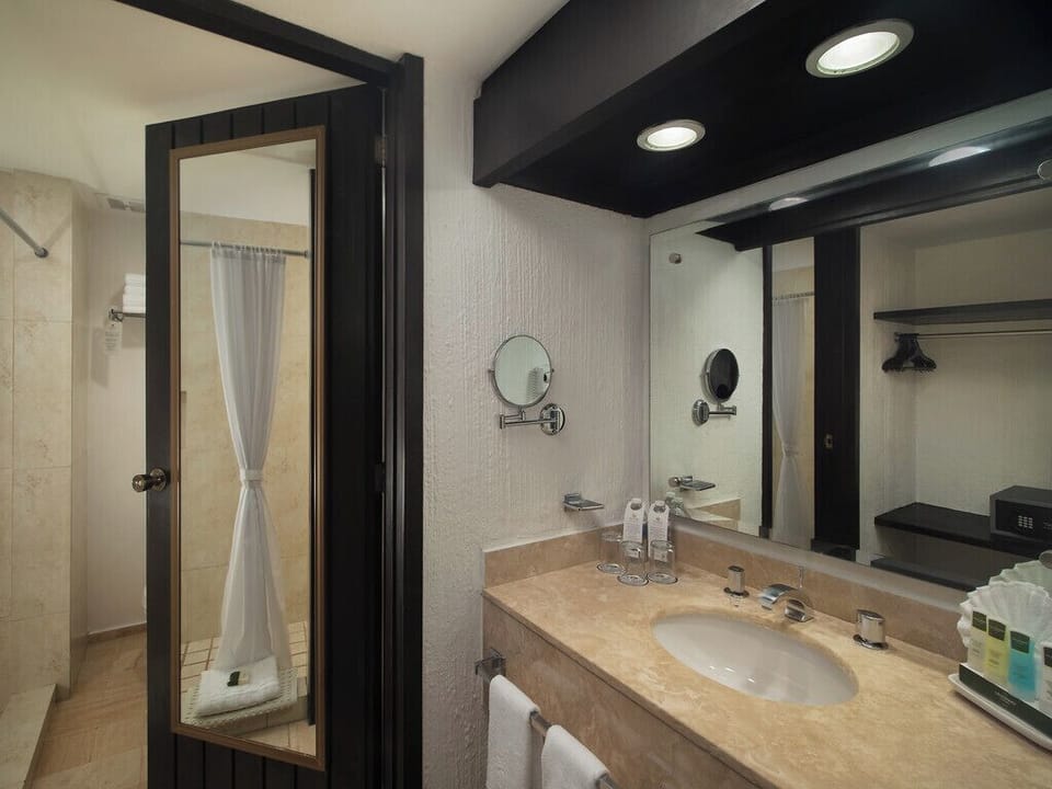 Shower, rainfall showerhead, hair dryer, towels