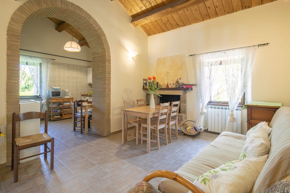 Family Apartment, 4 Bedrooms | Living area | Flat-screen TV