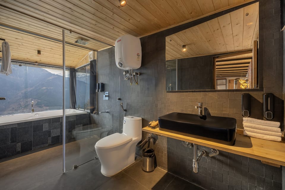 Separate tub and shower, free toiletries, slippers, towels