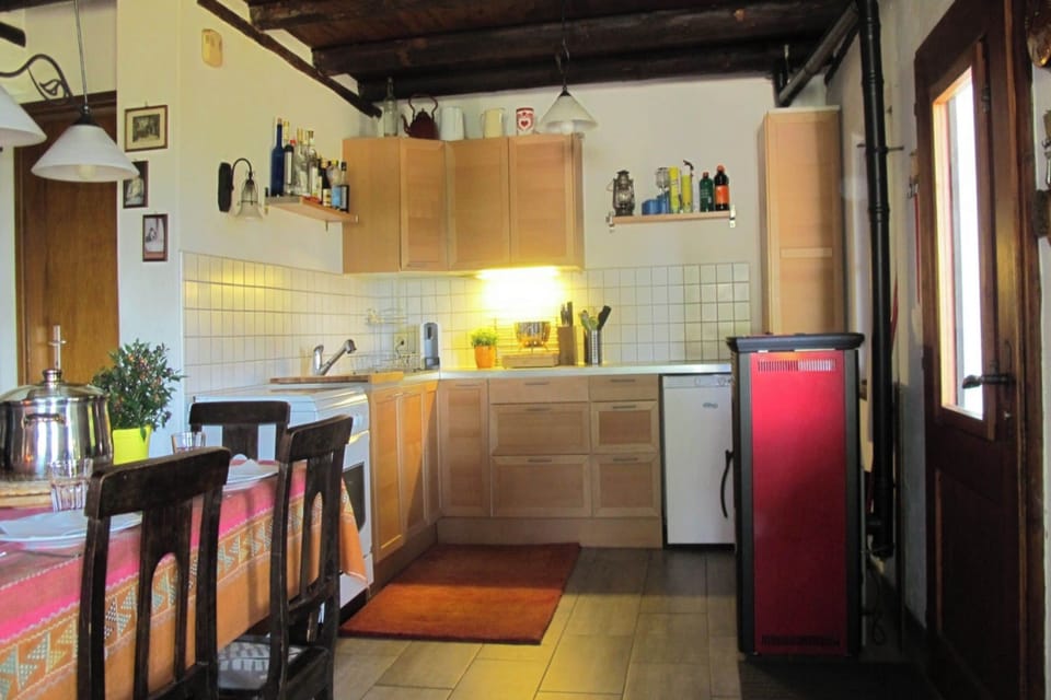 Family Chalet, Multiple Bedrooms, Mountainside (Ca Brunella 1) | Private kitchen | Fridge, oven, stovetop, coffee/tea maker
