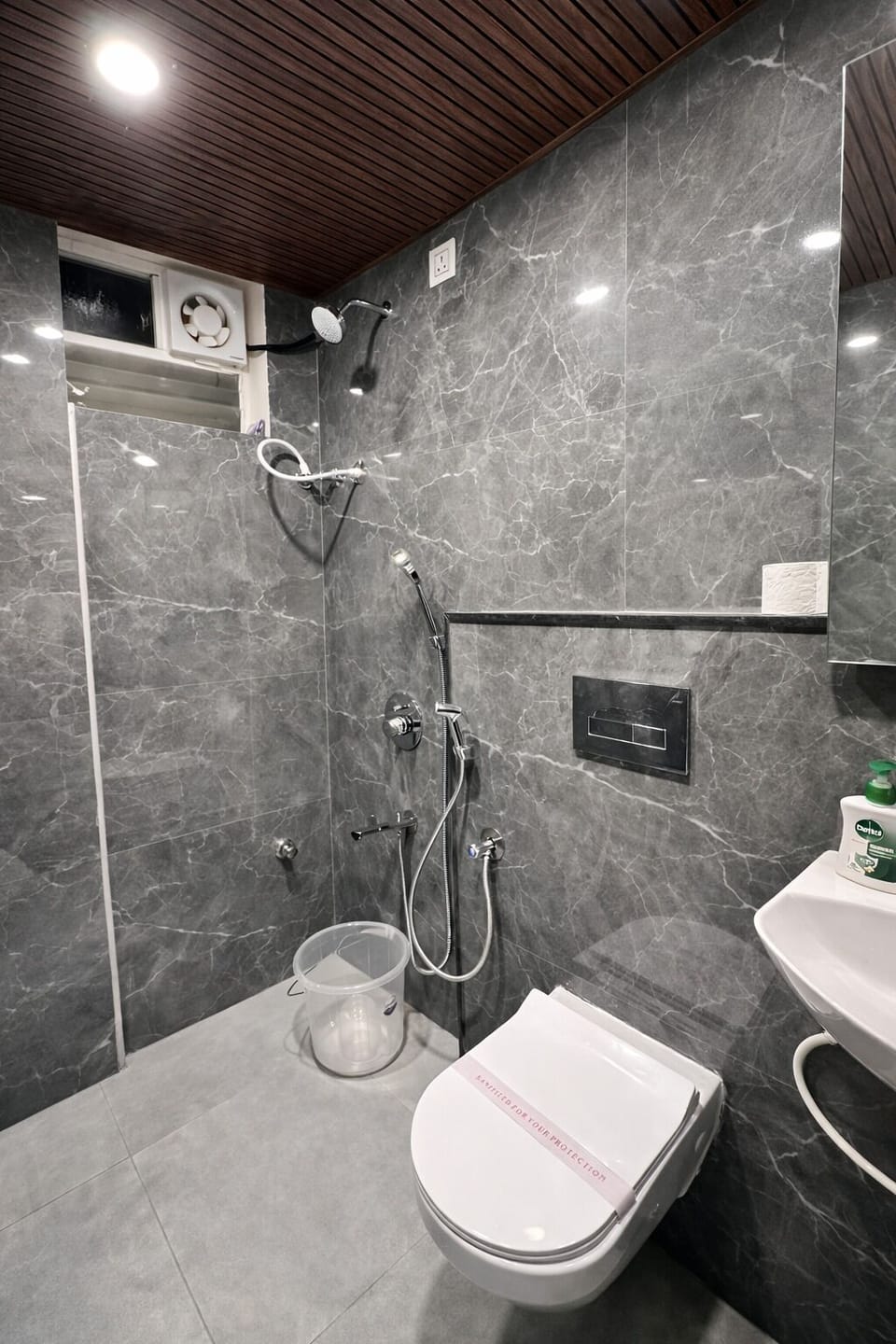 Shower, free toiletries, hair dryer, slippers