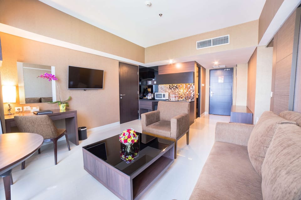 Suite, 1 King Bed, Non Smoking, City View | In-room safe, desk, laptop workspace, iron/ironing board