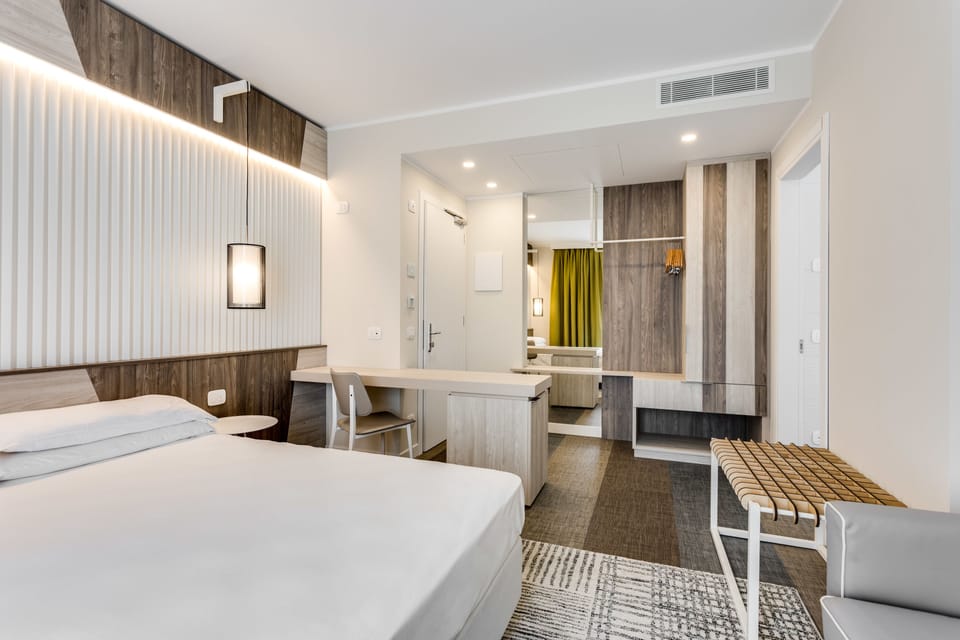 Junior Studio Suite, Balcony, Lakeside | In-room safe, desk, blackout drapes, soundproofing