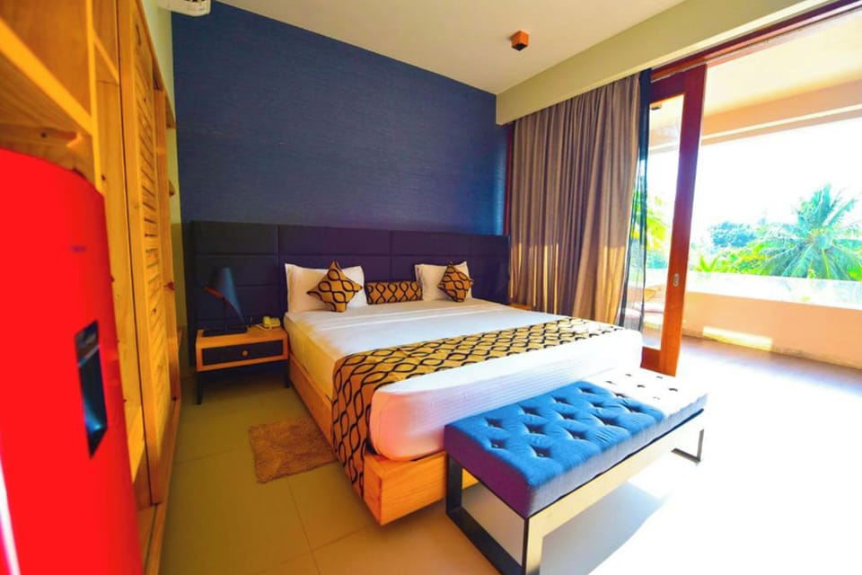 Deluxe Double Room, Balcony, Pool View | Desk, laptop workspace, WiFi (free), bed sheets