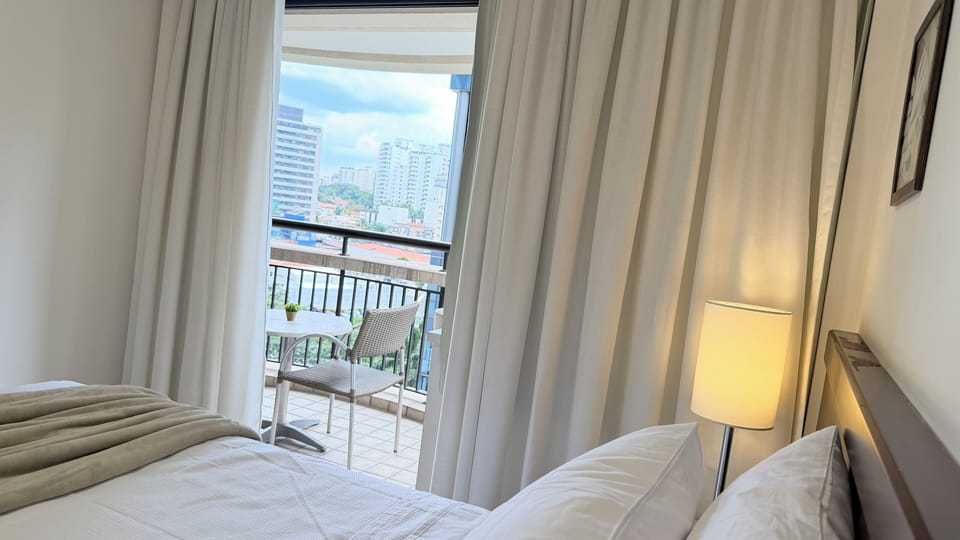 Deluxe Suite, 1 Queen Bed, City View | Desk, laptop workspace, iron/ironing board, WiFi (free)