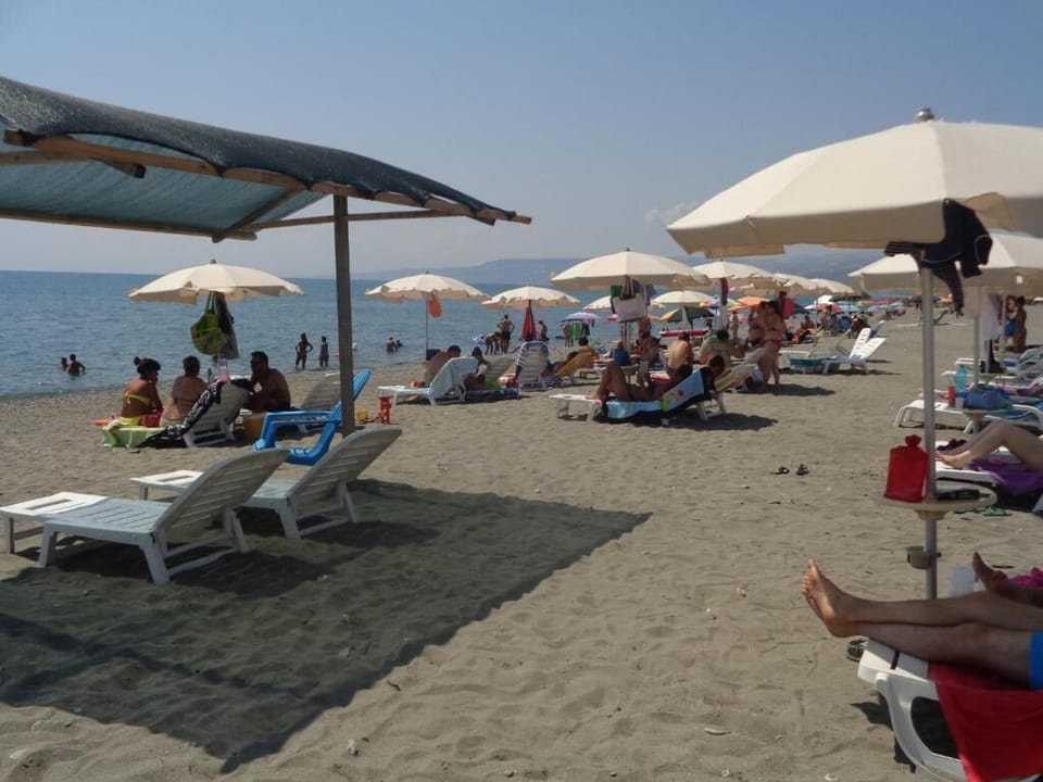 Private beach, white sand, sun loungers, beach umbrellas