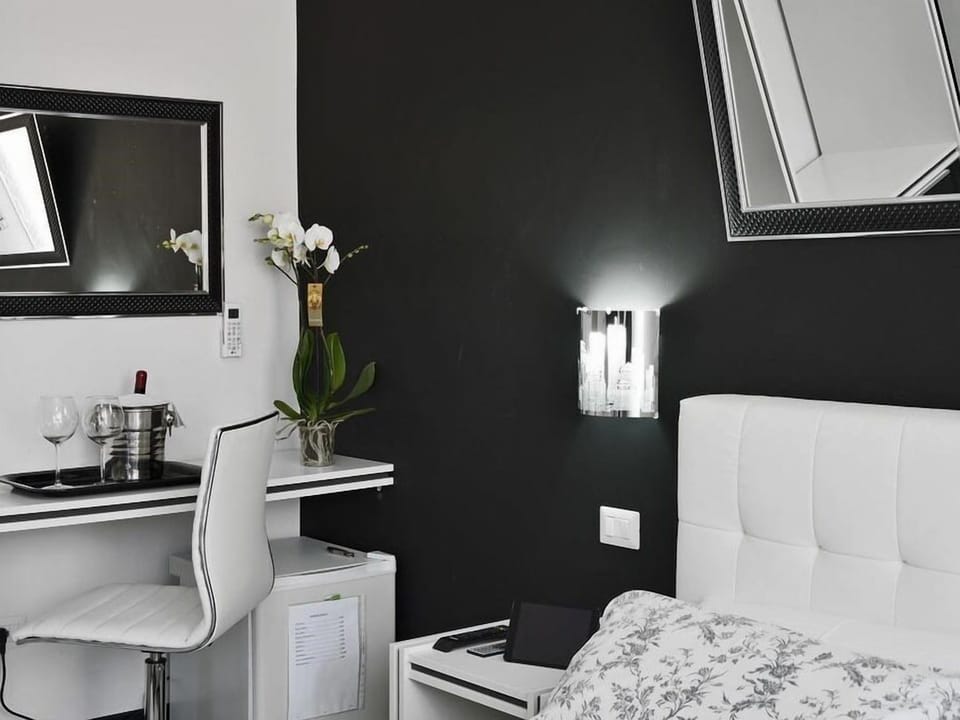Premium bedding, in-room safe, desk, iron/ironing board (on request)