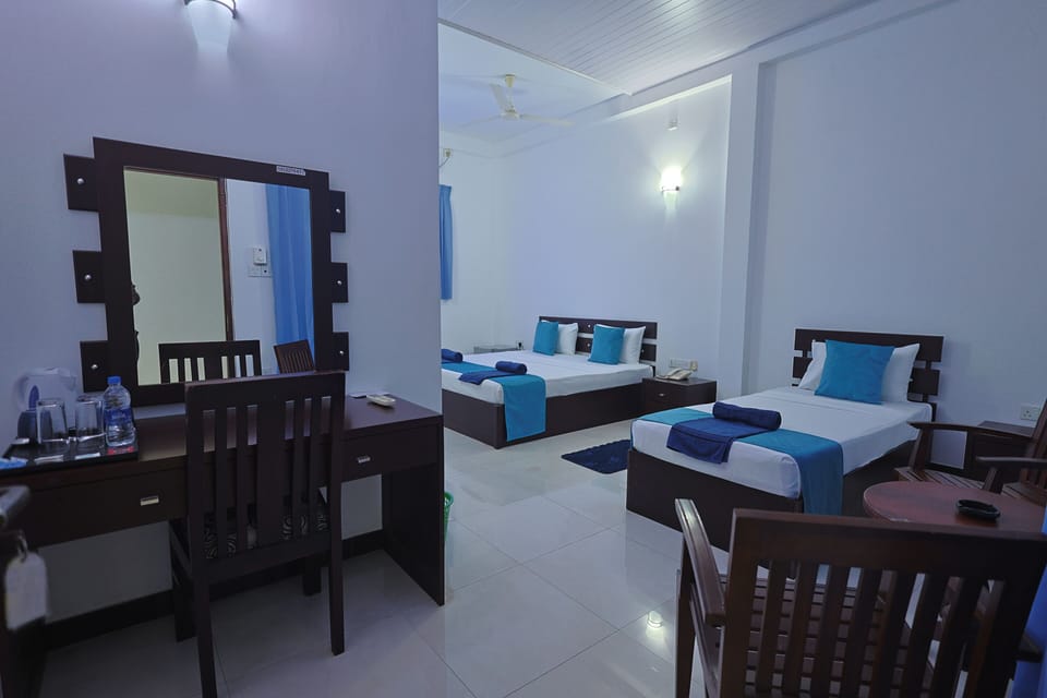 Standard Triple Room, Balcony | Desk, free WiFi