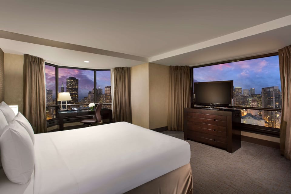 Suite, 1 Bedroom (Skyline Suite) | Premium bedding, down comforters, pillowtop beds, in-room safe