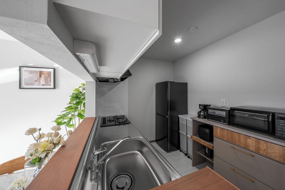 Apartment | Private kitchen | Fridge, microwave, stovetop, toaster