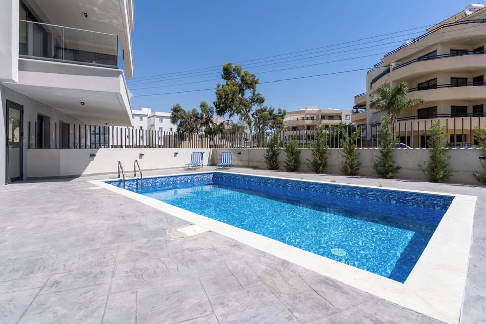 Outdoor pool, open 8:00 AM to 8:00 PM, sun loungers